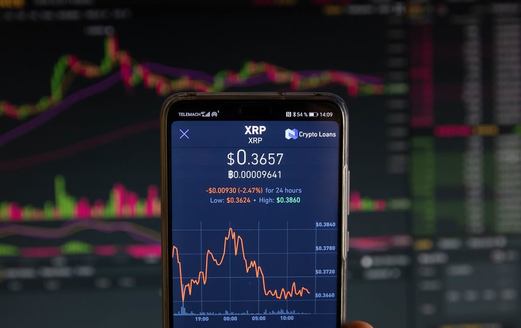 Ripple cryptocurrency price graph chart on mobile phone screen
